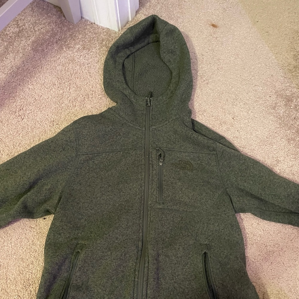 green north face jacket